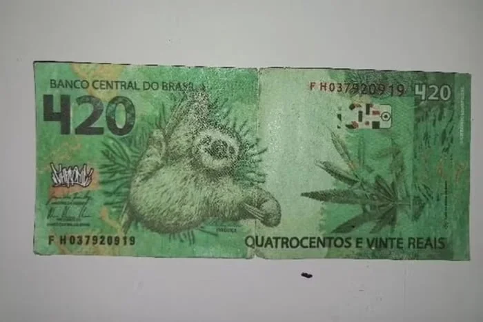 Polícia apreende nota falsa de R$ 420 com bicho-preguiça estampado