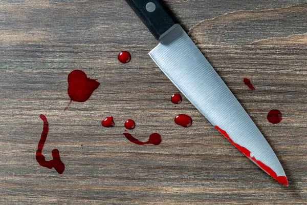 depositphotos_734053446-stock-photo-kitchen-knife-blood-blade-wooden.jpg